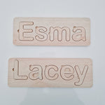 Plywood name puzzle boards.