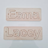 Plywood name puzzle boards.