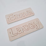 Plywood name puzzle boards.